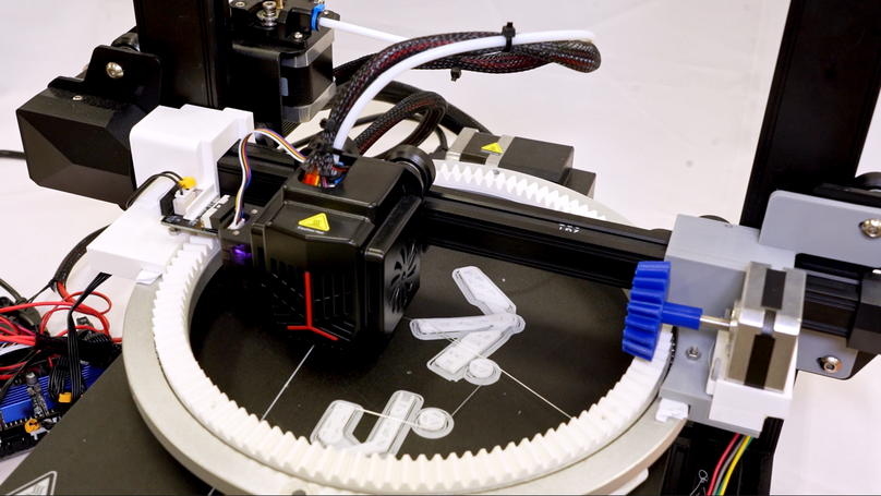 Rhapso: Automatically Embedding Fiber Materials into 3D Prints for Enhanced Interactivity